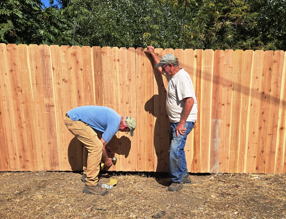 Clem and Cory install the last board!
